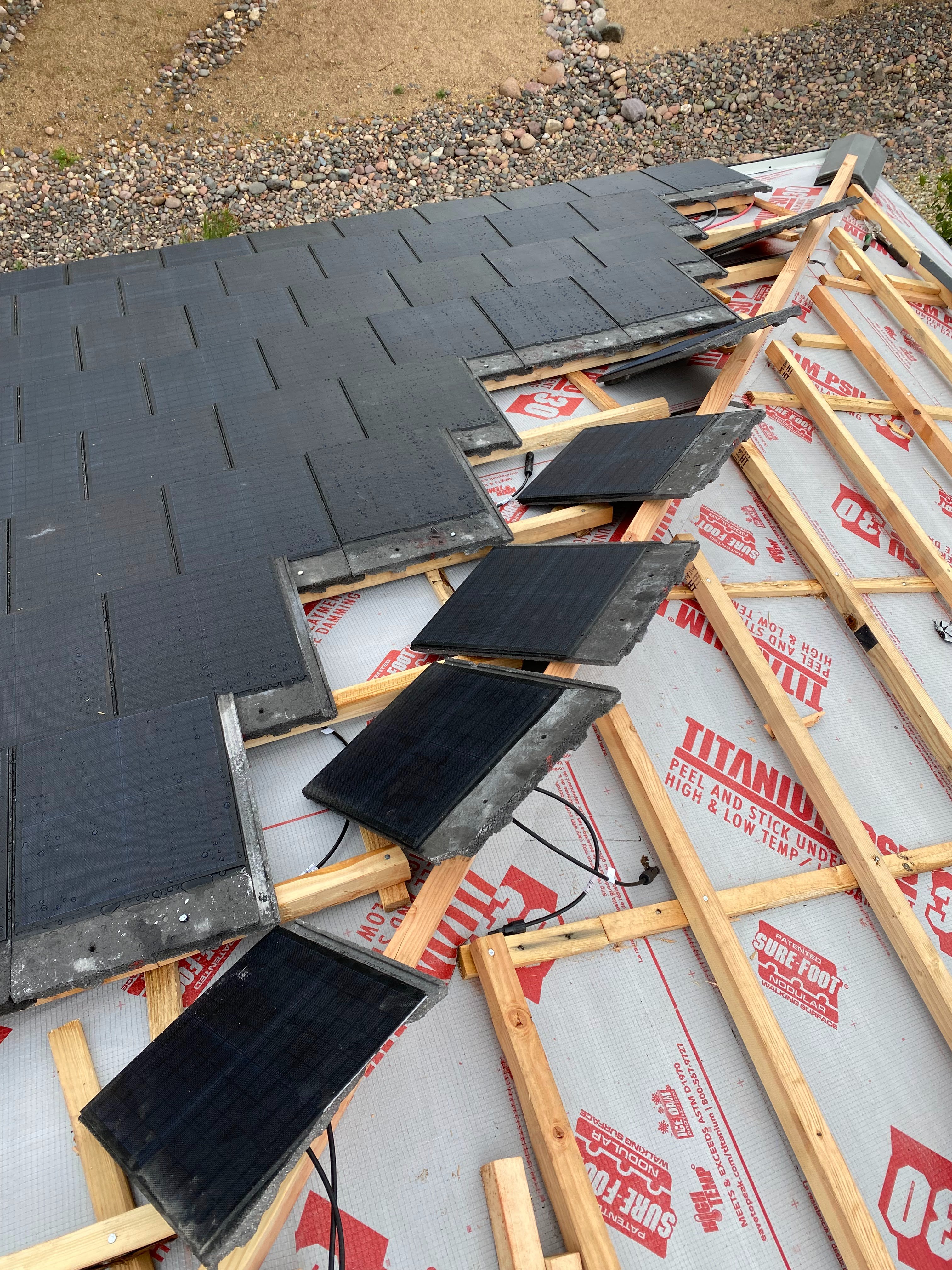 Self adhered underlayment and batten walking surface with tile and solar cells being installed